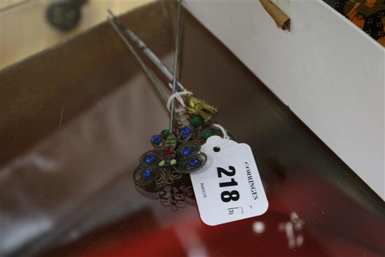 Three metal, glass and enamel hair ornaments